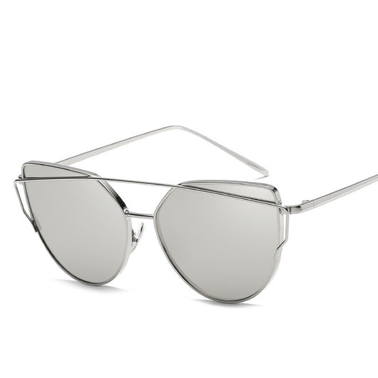 Black cat eye reflective women's sunglasses with dark lenses and a sleek metal frame, featuring a double bridge. - Image 9