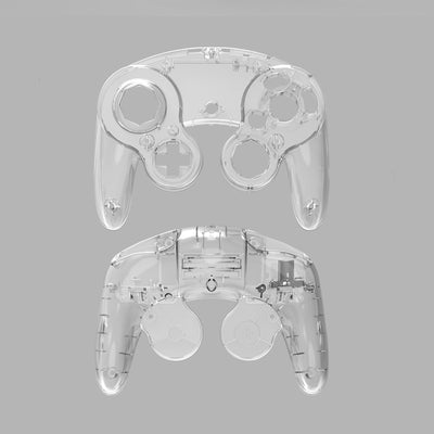 Orange ABS plastic replacement shell for an NGC single point GameCube controller, showing top and bottom pieces. - Image 2