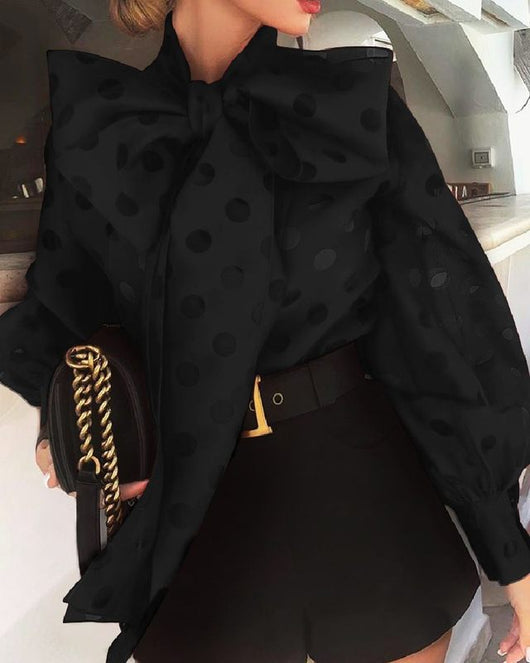 Blusa Elegante con Lunares Hueco y Moño Voluminoso en Mangas Linterna - Image 7