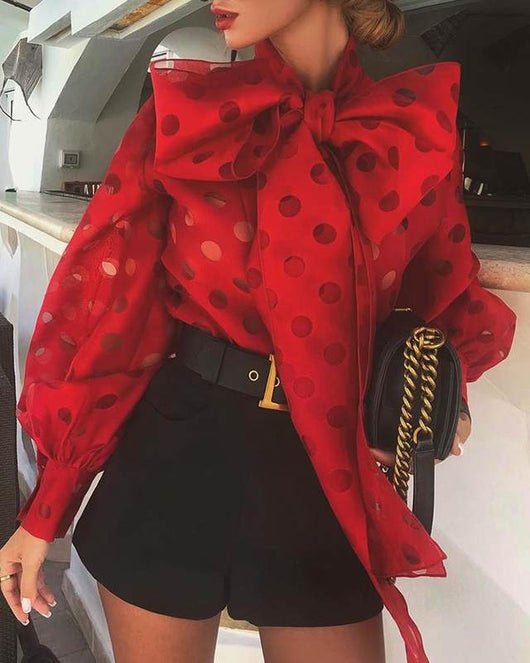 Blusa Elegante con Lunares Hueco y Moño Voluminoso en Mangas Linterna