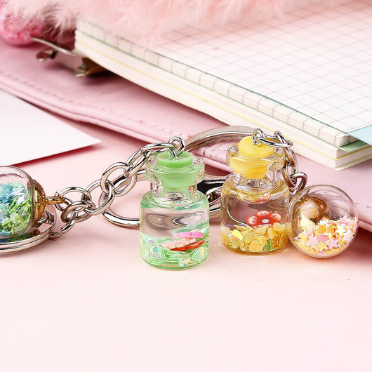 Llavero Colgante Flores Botella Quicksand Cute para Estudiante - Image 11