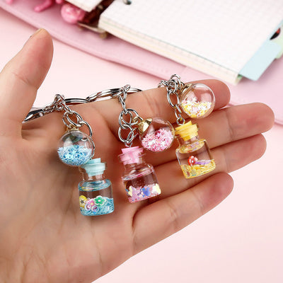 Llavero Colgante Flores Botella Quicksand Cute para Estudiante - Image 12