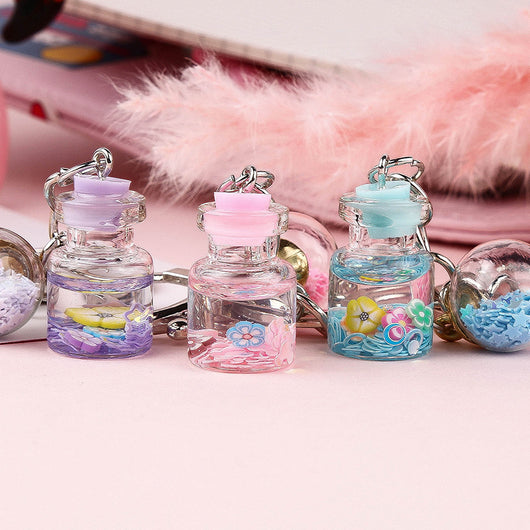 Llavero Colgante Flores Botella Quicksand Cute para Estudiante - Image 7