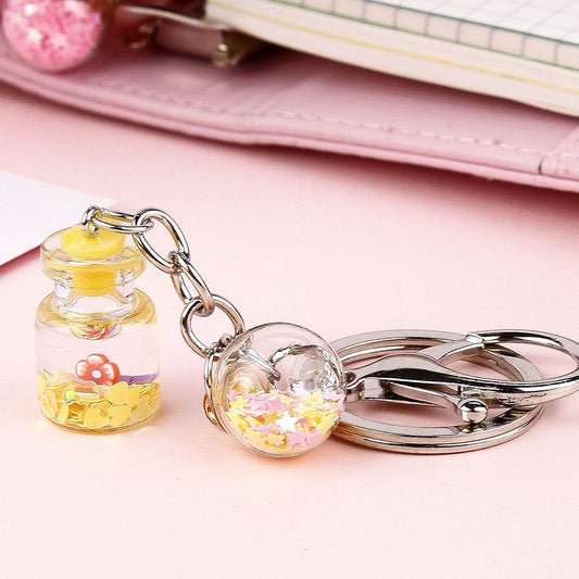 Llavero Colgante Flores Botella Quicksand Cute para Estudiante
