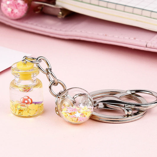 Llavero Colgante Flores Botella Quicksand Cute para Estudiante