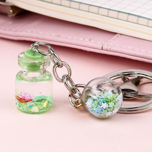 Llavero Colgante Flores Botella Quicksand Cute para Estudiante - Image 5