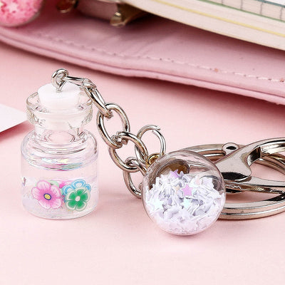 Llavero Colgante Flores Botella Quicksand Cute para Estudiante - Image 6