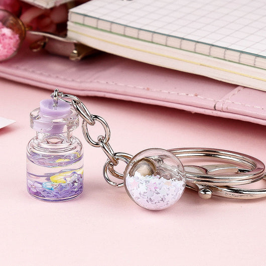 Llavero Colgante Flores Botella Quicksand Cute para Estudiante - Image 4