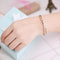 Pulsera de Diamantes con Palabras Romanas para Mujer