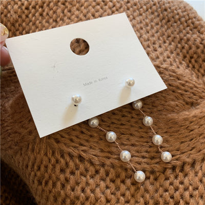 Aretes de Plata con Perlas Largas y Borla de Diseño Minimalista - Image 13