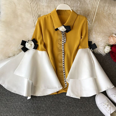 Blusa Elegante de Gasa con Mangas Voluminosas y Cuello Redondo