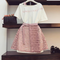 Conjunto Elegante: Camiseta Larga con Falda de Encaje Calado