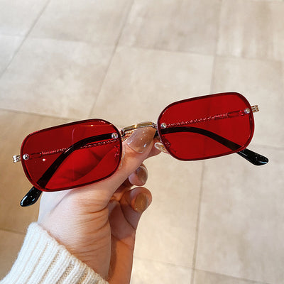 Trendy small frame square sunglasses with brown gradient lenses and gold-tone metal frames, held by a hand. - Image 14