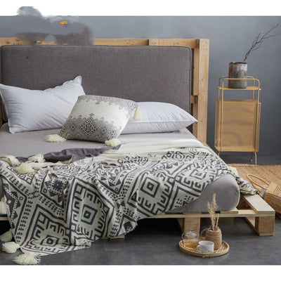 Manta de Algodón Tejida con Borlas - Comodidad y Estilo para tu Hogar