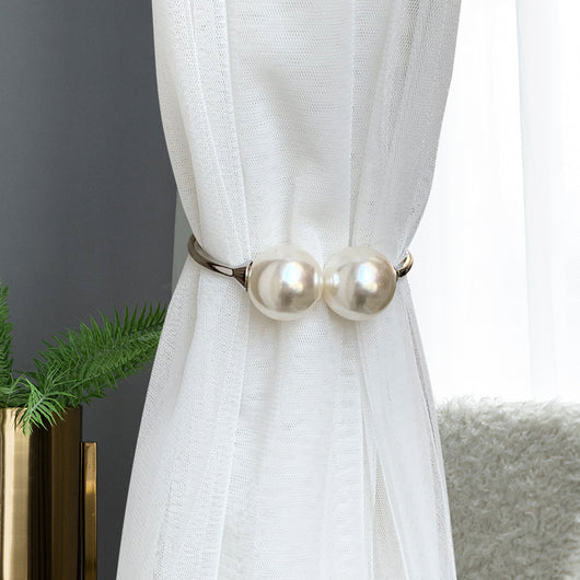 Gold alloy curtain tie-back with two large white faux pearls holding back a teal woven curtain. - Image 7