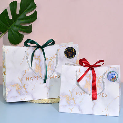 Roll of round 'Thank You' stickers with two floral designs: one dark with yellow flowers, one light blue with mixed flowers. - Image 6