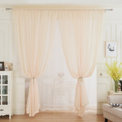 Light green sheer curtains hanging on a rod, one tied back, in a modern living room with white walls. - Image 7