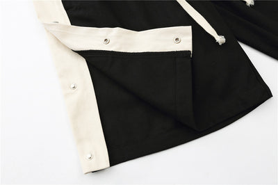 Pantalones Cortos con Costuras en Contraste y Puños Acampanados - Image 11
