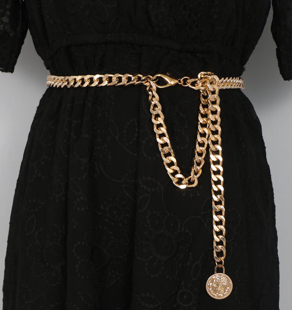 Suéter Elegante con Cadena Decorativa de Metal