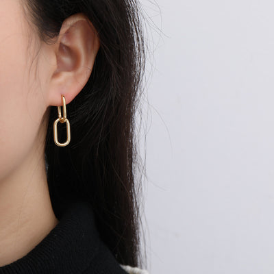 Aretes de Metal Frío Diseño Viento para Mujer - Image 4