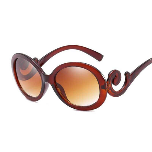 White retro ladies sunglasses with thick round frames, grey gradient lenses, and decorative scrollwork on the temples. - Image 11