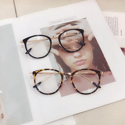 Lentes Redondos Unisex con Puente Metálico - Marco Plano Versátil