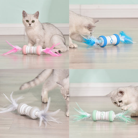 Pink and white electric cat toy with feathers on both ends, featuring a central power button. - Image 13