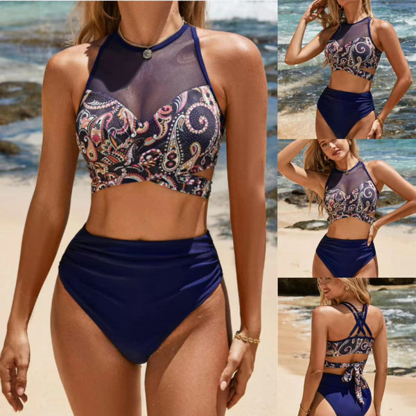 Women's navy blue high-waisted bikini with a paisley print halter top and mesh deep V neckline.