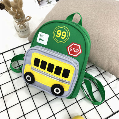 Green mini backpack for kids with a yellow school bus design on the front pocket, 'EXIT', '99', and 'STOP' patches. - Image 5