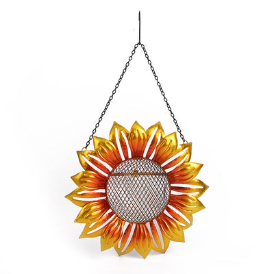 Yellow and orange wrought iron flower-shaped bird feeder with a mesh seed tray and hanging chain. - Image 6