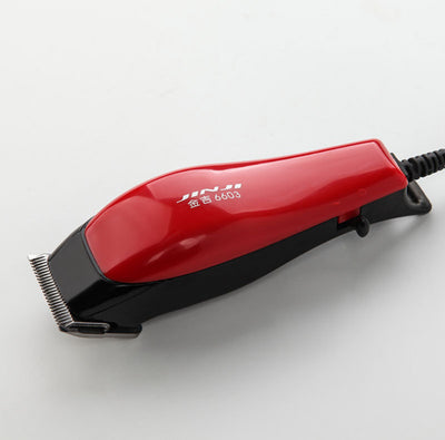 Red corded electric hair clipper with stainless steel blade, two black guide combs, two replacement blades, oil, and brush. - Image 24