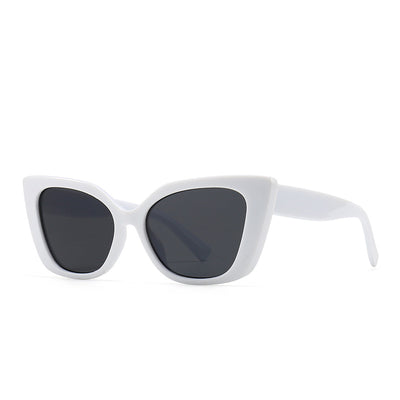 White cat-eye frame sunglasses with dark lenses, featuring a vintage-inspired design. - Image 9