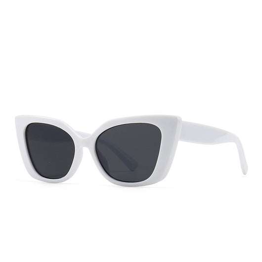 White cat-eye frame sunglasses with dark lenses, featuring a vintage-inspired design. - Image 9