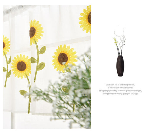 White sheer curtain with embroidered yellow sunflowers and green stems, hanging on a window rod. - Image 13