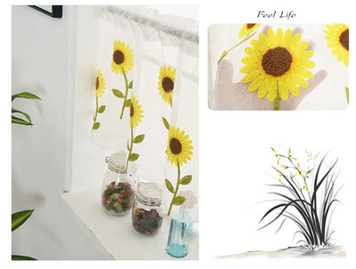 White sheer curtain with embroidered yellow sunflowers and green stems, hanging on a window rod. - Image 3