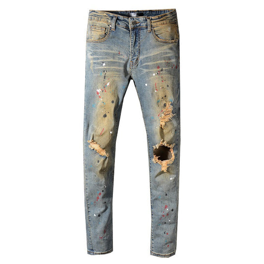 Jeans Rotos Estilo Cowboy Vintage con Detalles Amarillos y Destrucción Artesanal