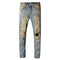 Jeans Rotos Estilo Cowboy Vintage con Detalles Amarillos y Destrucción Artesanal