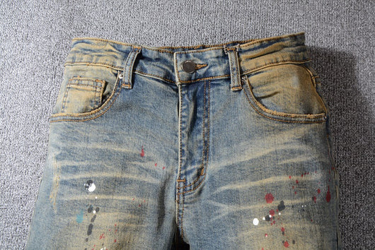 Jeans Rotos Estilo Cowboy Vintage con Detalles Amarillos y Destrucción Artesanal - Image 3