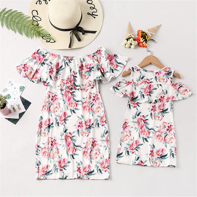 Matching white floral off-shoulder ruffle dresses for mother and daughter, featuring pink flowers and green leaves. - Image 9