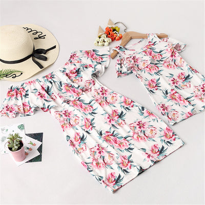 Matching white floral off-shoulder ruffle dresses for mother and daughter, featuring pink flowers and green leaves. - Image 4