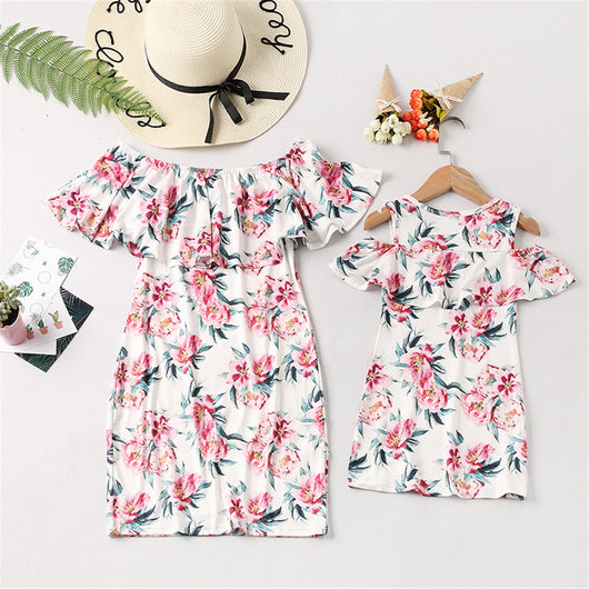 Matching white floral off-shoulder ruffle dresses for mother and daughter, featuring pink flowers and green leaves. - Image 3