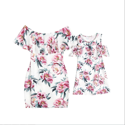 Matching white floral off-shoulder ruffle dresses for mother and daughter, featuring pink flowers and green leaves. - Image 5