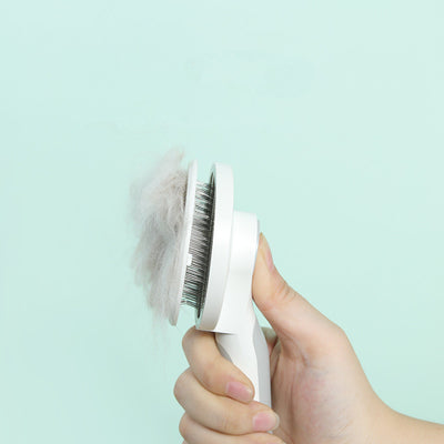 Peine Masajeador para Mascotas con Mango Redondo y Perlas Adhesivas - Image 9