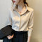 Blusa de Seda Blanca Diseño Minimalista Elegante