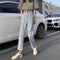 Women's Ripped Frayed Jeans - 9-Point Cut