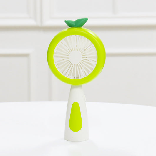 White and lime green children's handheld fan with a round head, small leaf accent, and fruit-like design. - Image 4