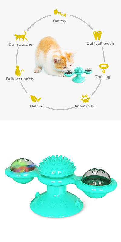 Gray tabby cat playing with a teal windmill cat toy featuring a suction cup base, textured ball, and colorful spinning paddles. - Image 15