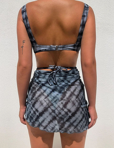 Blue and black tie-dye three-piece bikini set with cross-tie top, matching bottoms, and sheer sarong. - Image 12