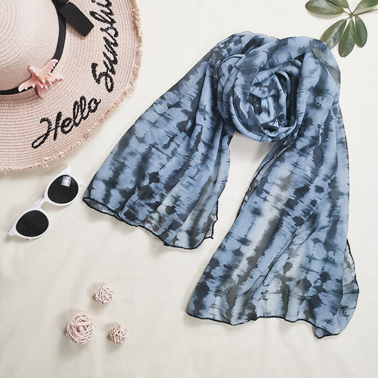 Blue and black tie-dye three-piece bikini set with cross-tie top, matching bottoms, and sheer sarong. - Image 16