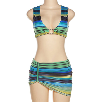 Women's green, blue, and yellow striped two-piece set with a V-neck crop top and an asymmetrical mini skirt. - Image 12